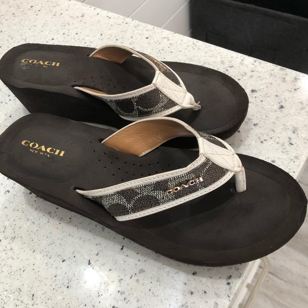 Dark brown Coach wedge flip flops